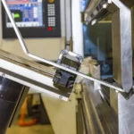 hand-robot-working-automatic-cutting-bending-metal-sheet-operator-machine-141535264