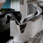 Modern hydraulic metal bending machine in a metallurgical factory